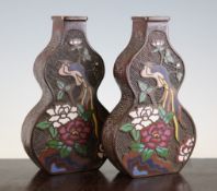 A pair of Japanese bronze and champleve enamel flattened double gourd shaped vases, early 20th