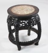 A 19th century Chinese hardwood drum shaped occasional table, with marbe inset top, H.1ft 7in.