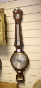 C. Gerletti, Glasgow. A Regency ebony strung mahogany wheel barometer, with silvered hygrometer,