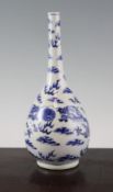 A Chinese blue and white `dragon` bottle vase, late 19th century, painted with confronting dragons