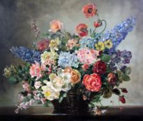 § Cecil Kennedy (1905-1997)oil on canvas,Still life of garden flowers in a wicker basket,signed,25 x