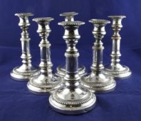 A set of six 19th century Sheffield plate telescopic candlesticks, with gadrooned borders, on