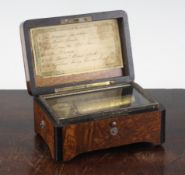A small Victorian thuya wood and ebony cased cylinder music box, playing six airs, the movement