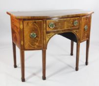 A small Regency rosewood banded mahogany bowfront sideboard, fitted three drawers, on square tapered