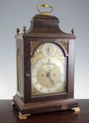 John Taylor, London. A George III mahogany bracket clock, the 7 inch arched brass dial with silvered