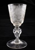 A Dutch goblet, 18th century, the round funnel bowl wheel engraved with deer leaping amid flowers