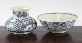 A Provincial Ming blue and white bowl and a similar vase, the Swatow bowl decorated with panels of