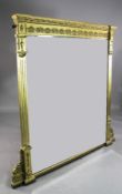 A late Victorian neo classical gilt overmantel mirror, with rectangular bevelled glass plate, the