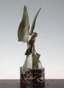 Ernst Rischmann. An Art Deco bronze figure of an eagle, perched upon a jagged rock, signed with