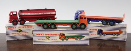 A Dinky Supertoys 903 Foden flat bed truck, in orange and blue, together with a 902 Foden flat truck