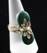 A 14ct gold malachite and diamond set up-finger ring, with pierced shoulders, size O.