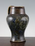 A Martin Brothers inverted pyriform stoneware jug, incised with scrolling foliage, signed `R. W.