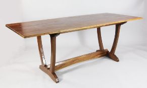 A 20th century mahogany Cotswold School rectangular dining table, in the manner of Barnsley, stamped