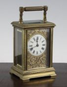 A late 19th century French gilt brass carriage timepiece, with fret work dial, 5.25in.