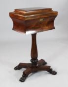 A Victorian mahogany teapoy, with sarcophagus top and saltire base, on lions paw feet, 1ft 7in.