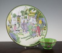 A Canton enamel dish and a similar bowl, early 20th century, the circular dish painted with an