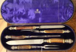 A cased Victorian silver mounted staghorn handled five piece carving set, makers Mappin & Webb,