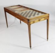 A Georgian style mahogany combination games table, with baize lined top, leather lined trays for
