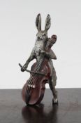 A late 19th century Austrian cold painted bronze model of a hare playing a cello, base stamped