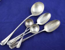 Five items of late Victorian silver hanovarian rat tail pattern flatware, with engraved monogram,