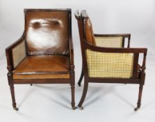 A pair of Regency mahogany library bergeres, with caned backs and side panels, tan leather