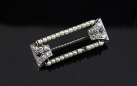 A 1920`s 18ct white gold, sapphire, diamond and seed pearl set brooch, of rectangular openwork