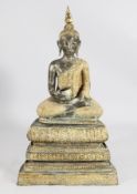A Thai bronze seated figure of Buddha, holding an alms bowls, `jewelled` decoration, 42in.