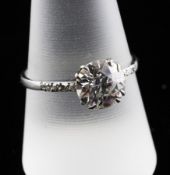 A 1920`s/1930`s platinum and solitaire diamond ring, the round cut stone weighing approximately 2.