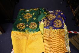 Two Chinese embroidered silk robes, mid 20th century, each decorated with dragon motifs