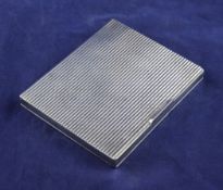 A 1940`s continental ribbed silver cigarette case inscribed to "Alf Padgham, Alexandria Sporting