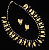 An Etruscan Revival gold and blue enamel fringe necklace and matching earrings, in "G. F. Triunfo,