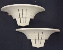 A pair of white painted plaster Art Deco wall lights, with stamped mark for Arlus, Paris, France,