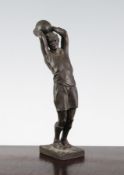 A 20th century bronze figure of a footballer holding a ball, on rectangular base, unsigned, 8in.