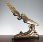 Soleau. An Art Deco bronze model of a seagull flying above a wave, signed, with black marble plinth,