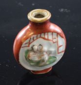 A Chinese erotic subject moulded porcelain snuff bottle, 19th century, decorated to each side with