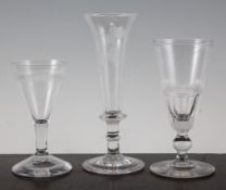 Three George III ale glasses, c.1800, the first with slender flared bowl wheel engraved with hops