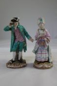 A pair of Meissen figures `The Racegoers`, late 19th century, the lady and gentleman wearing 18th