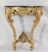 A Louis XVI style giltwood console table, with variegated black marble top and scroll and foliate