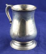An early George III silver baluster mug, with later military inscription to "Lt. Col. John Dutton,