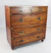 A late Victorian teak campaign chest, fitted two short and three long drawers, on turned feet, 3ft