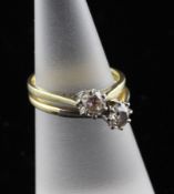 Two 18ct gold and solitaire diamond rings, sizes J & K.