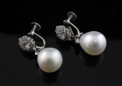 A pair of white gold, pear shaped cultured pearl and diamond cluster drop ear clips, 1in.