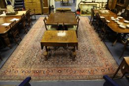 A large Oriental carpet. with extensive field of geometric foliate motifs on a blue ground, with