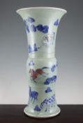 A large Chinese underglaze blue and copper-red beaker vase, gu, Kangxi period, painted with the