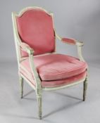 A 19th century Louis XVI style white painted fauteuil, with pink dralon upholstered back, arms and