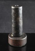 A Chinese inscribed black jade cylindrical bead, possibly archaic with later five column