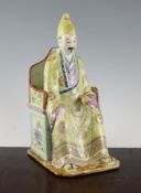 A large Chinese famille rose enamelled seated figure of a Lama, late 19th / early 20th century,