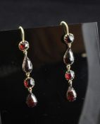 A pair of 19th century style gold and garnet drop earrings, 1.5in.