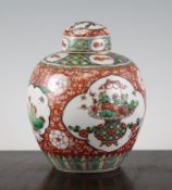 A Chinese famille verte ovoid ginger jar and cover, 19th century, painted with reserves of