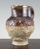 A Mortlake (probably Kishere) stoneware jug, with plated rim, reeded neck, rectangular plaque of `